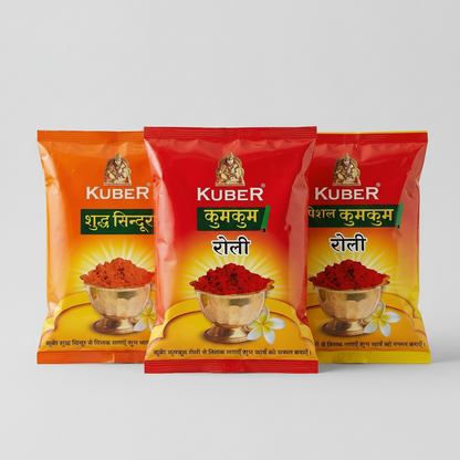 Three Kuber brand spice packets on a light background