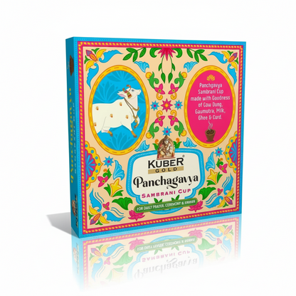 Colorful packaging of Kuber Gold Panchagavya Sambrani Cup with decorative elements on a white background